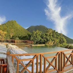 Eco-friendly travel in Dominica surrounded by lush rainforest and green adventures