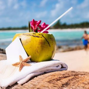 Retired couple watching the sunset in Dominica