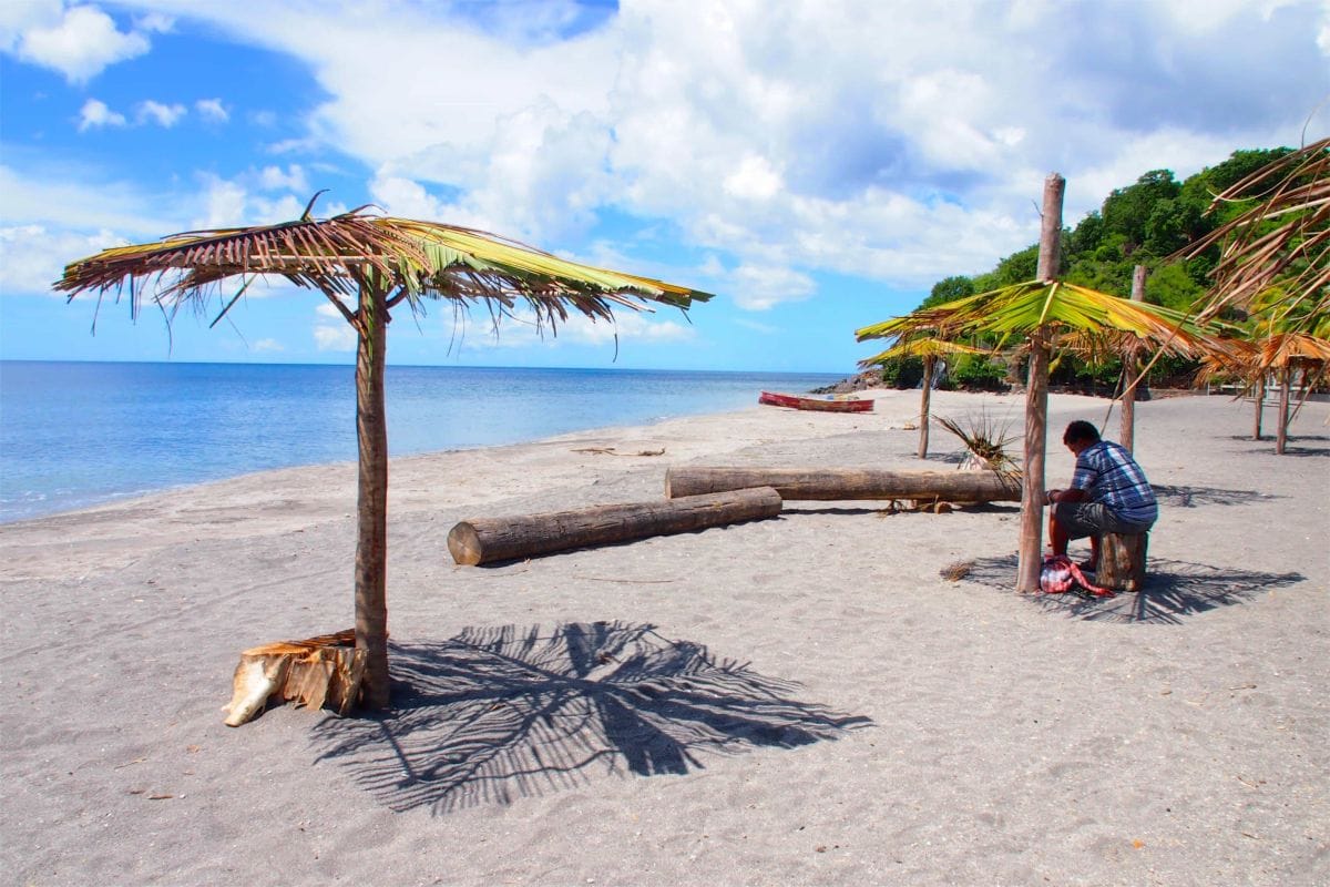 People swimming safely at Mero Beach, Dominica
