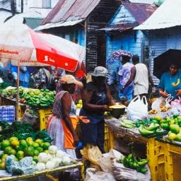 Vendors speaking Creole at Roseau Market in Dominica