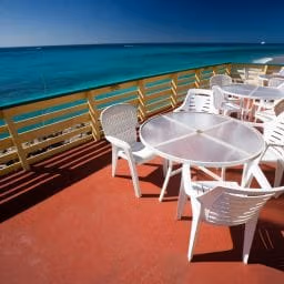 Remote worker with laptop at Urban Garden Café in Dominica