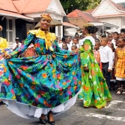 People in traditional Creole dress celebrating Dominica’s Independence Day