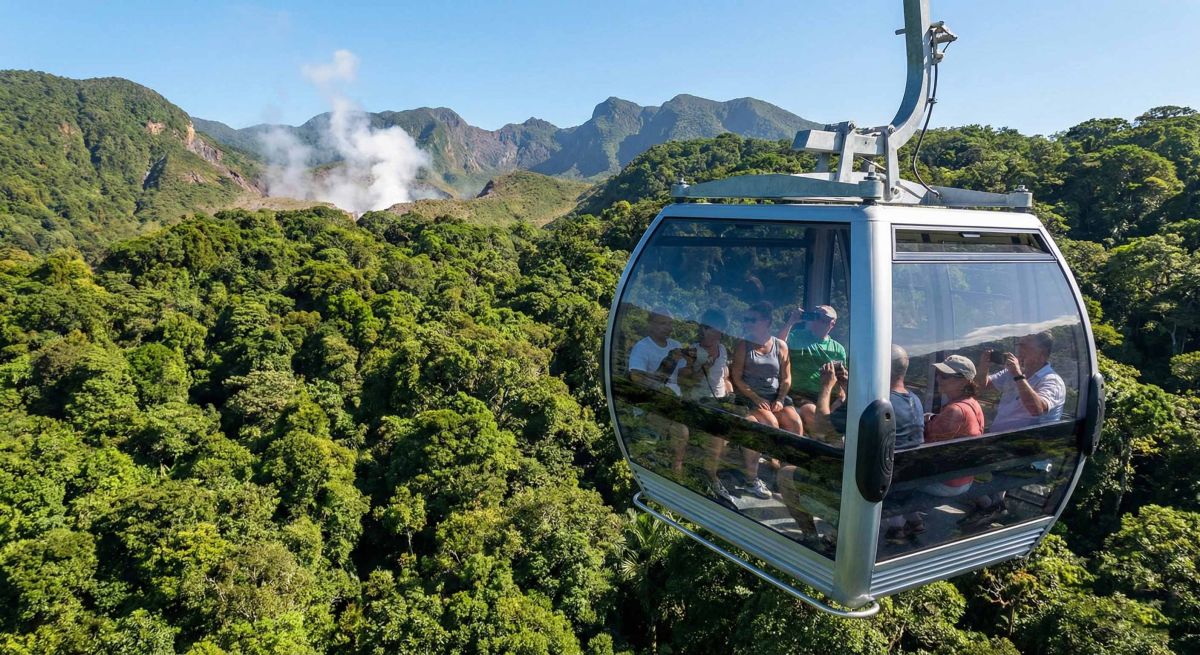 The world's longest cable car gliding over the Dominica rainforest towards Boiling Lake.